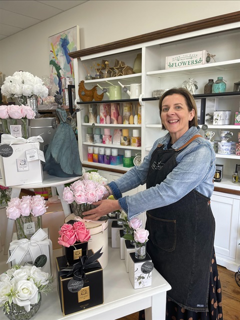 Mandie from Hello Petals holding flowers