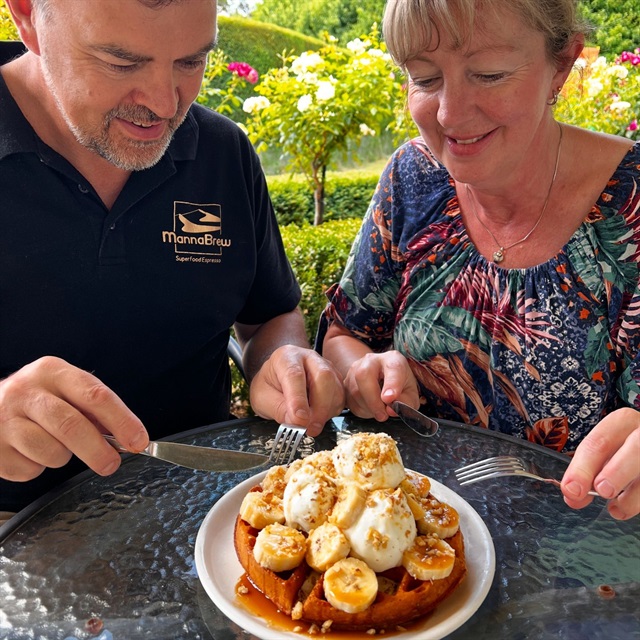 Francois and Tania eating waffles